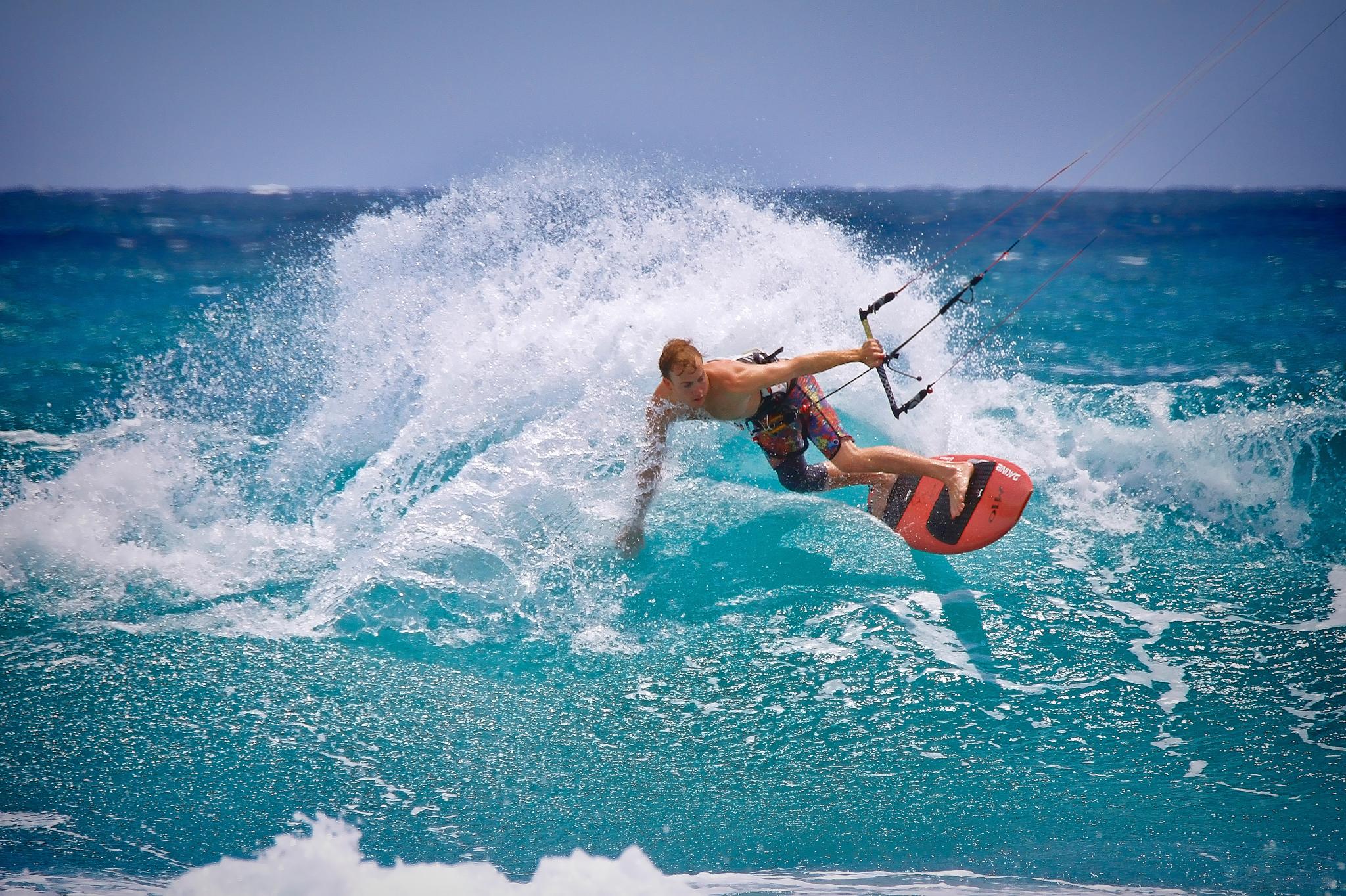 man kitesurfing